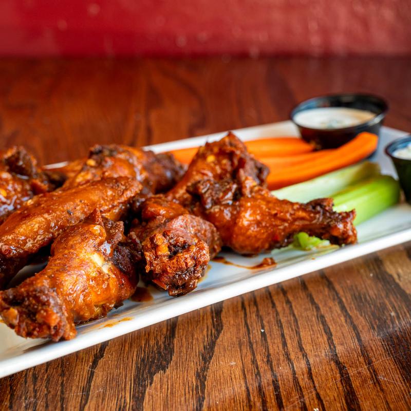 Buffalo chicken wings, served with celery, carrots, blue cheese, and ranch dressing.