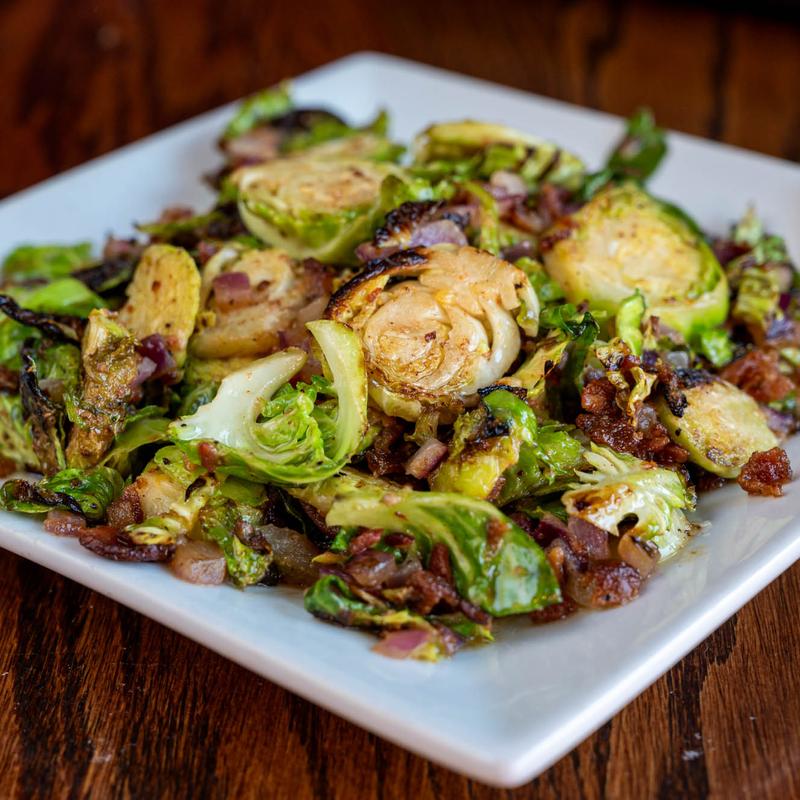 Brussels Sprouts, with caramelized onion, garlic, bacon, and sherry bacon vinaigrette.